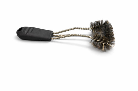 Kleine Grillbürste weißem Hintergrund